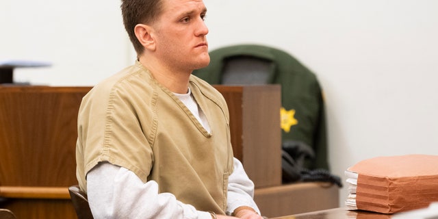 Josh Waring waits during a hearing in superior court in Santa Ana, CA on Friday, March 6, 2020. Waring, the son of ex-'Real Housewives of Orange County' star Lauri Peterson, pled guilty to charges related to the shooting of a man outside a sober living home in 2016. He was released from jail for time served.