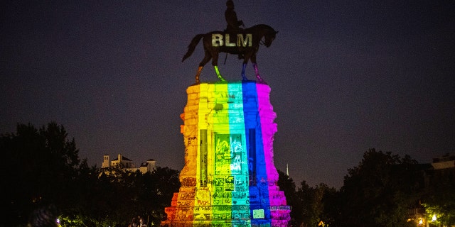 Pride (rainbow) color projected over the statue of Confederate General Robert Lee on June 12, 2020 in Richmond, Virginia. 