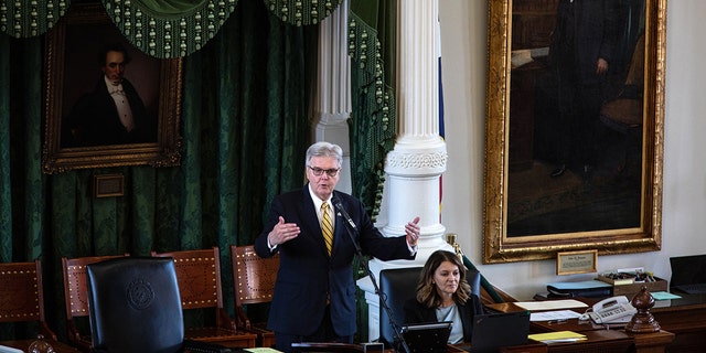 This file photo shows Texas Lt. Gov. Dan Patrick speaks in the state Senate chamber on the first day of the 87th Legislature's third special session at the State Capitol on September 20, 2021, in Austin, Texas. 