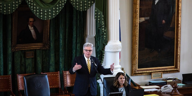 This file photo shows Texas Lt. Gov. Dan Patrick speaks in the state Senate chamber on the first day of the 87th Legislature's third special session at the State Capitol on September 20, 2021, in Austin, Texas. 