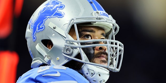 Detroit Lions defensive tackle John Penisini on the sideline during a game against the Cincinnati Bengals in Detroit Oct. 17, 2021.
