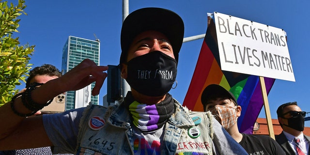People rally in support of the Netflix transgender walkout in Los Angeles, California, on Oct. 20, 2021.
