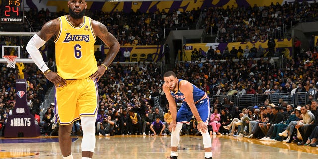 Los Angeles Lakers' LeBron James (6) and Golden State Warriors' Stephen Curry (30) during a game on March 5, 2022 at Crypto.Com Arena in Los Angeles.