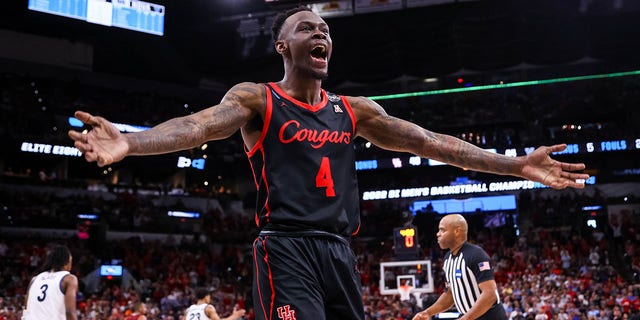 Taze Moore (4) of the Houston Cougars reacts during a game against the Villanova Wildcats during the Elite Eight of the 2022 NCAA men's basketball tournament March 26, 2022, in San Antonio, Texas. 