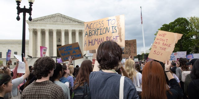 Youth pro-abortion rights demonstrators with Generation Ratify and other organizations rally outside of the Supreme Court in Washington, D.C. on May 5, 2022, following the leak of a draft Supreme Court opinion to overthrow Roe vs. Wade.