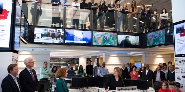 The Washington Post via Getty Images Executive Editor, Sally Buzbee speaks after the paper was awarded the 2022 Pulitzer Prize for Public Service as employees of The Washington Post via Getty Images gather in the newsroom to watch the presentations on Monday May 09, 2022 in Washington, DC.