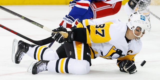 Pittsburgh Penguins center Sidney Crosby on the ice after being hit by Rangers defenseman Jacob Trouba on May 11, 2022, at Madison Square Garden in New York City.