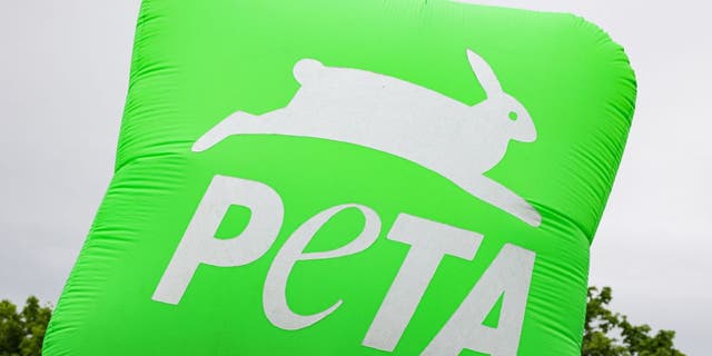 The logo of the international non-governmental animal rights organisation People for the Ethical Treatment of Animals (PETA) is pictured in Stuttgart, southern Germany, on May 13, 2022.