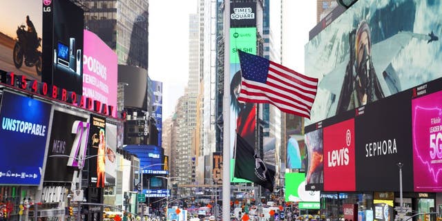 A U.S. flag is seen on Times Square in New York, the United States, June 2022.
