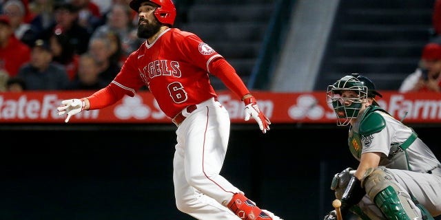 Los Angeles Angels third baseman Anthony Rendon (6) singles to left off of Oakland Athletics relief pitcher Lou Trivino (62) in the bottom of the sixth inning at Angel Stadium of Anaheim on Saturday, May 21, 2022, in Anaheim, California. 