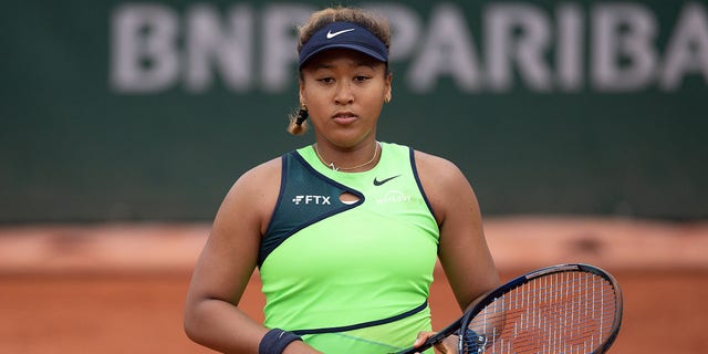 Naomi Osaka of Japan vs Amanda Anisimova of USA during the Women's Singles First Round match on Day 2 of The 2022 French Open at Roland Garros on May 23, 2022 in Paris, France. 