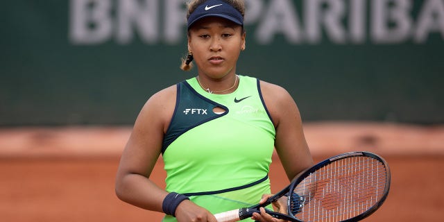 Naomi Osaka of Japan vs Amanda Anisimova of USA during the Women's Singles First Round match on Day 2 of The 2022 French Open at Roland Garros on May 23, 2022 in Paris, France.