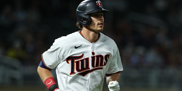 Max Kepler #26 of the Minnesota Twins advances to first base on a walk against the Detroit Tigers in the ninth inning at Target Field on May 23, 2022 in Minneapolis, Minnesota. The Twins defeated the Tigers 5-4. 