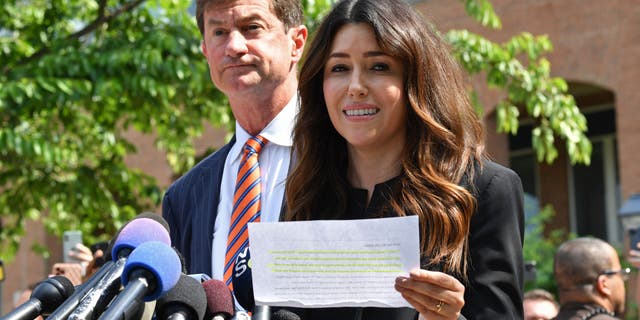 Ben Chew and Camille Vasquez, attorneys for Johnny Depp, address the media outside the Fairfax County Circuit Courthouse in Fairfax, Virginia, on June 1.