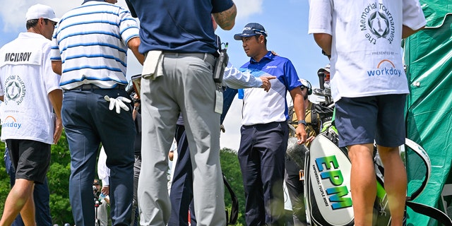 Hideki Matsuyama of Japan is disqualified from the tournament on the 10th tee box during the first round of the Memorial Tournament presented by Workday at Muirfield Village Golf Club on June 2, 2022 in Dublin, Ohio. 