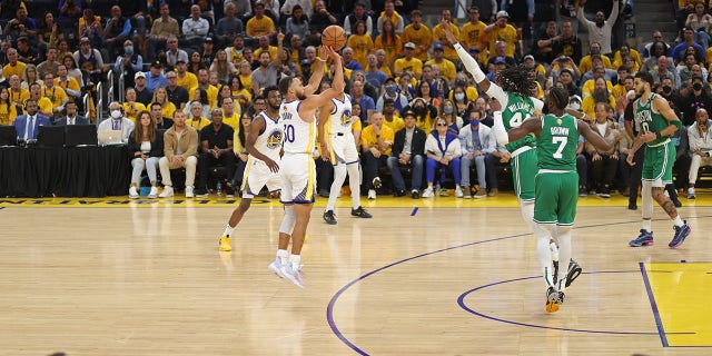 Stephen Curry of the Golden State Warriors shoots against the Boston Celtics during the NBA Finals on June 2, 2022, at Chase Center in San Francisco.