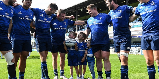 Dublin , Ireland - 4 June 2022; Seán Cronin of Leinster with his children Finn, Cillian and Saoirse in the team huddle after their side's victory in the United Rugby Championship Quarter-Final match between Leinster and Glasgow Warriors at RDS Arena in Dublin.