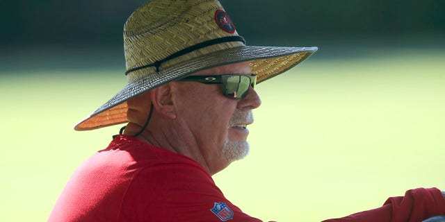 Bruce Arian, senior advisor to the Tampa Bay Buccaneers general manager, looks at the field from his golf cart during the Tampa Bay Buccaneers Minicamp at AdventHealth Training Center at One Buccaneers Place on June 07, 2022 in Tampa, Florida. 