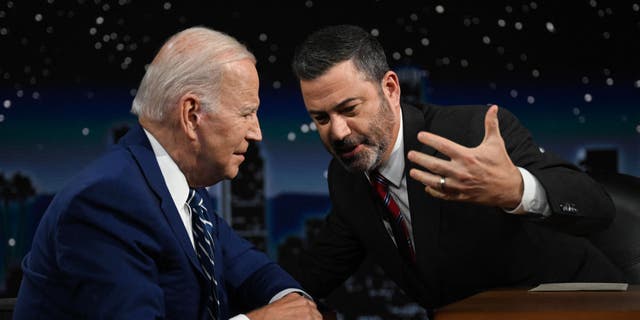 President Biden speaks with host Jimmy Kimmel. (Photo by Jim WATSON / AFP) (Photo by JIM WATSON/AFP via Getty Images)