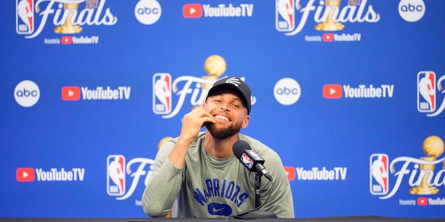 Stephen Curry of the Golden State Warriors is shown speaking to the media during the 2022 NBA Finals on June 9, 2022 in Boston. James Patterson told Fox News Digital that he would love to do a book project with Curry.