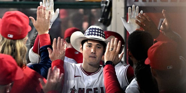 Angels pitcher Shohei Ohtani hit a two-run home run against the Red Sox in the fifth inning at Anaheim Stadium Thursday.