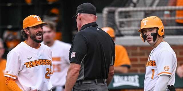 Tennessee head coach Tony Vitello discusses a call with an umpire during one of the NCAA Super Regionals game between the Tennessee Volunteers and Notre Dame Fighting Irish at Lindsay Nelson Stadium on June 10, 2022 in Knoxville, TN. 