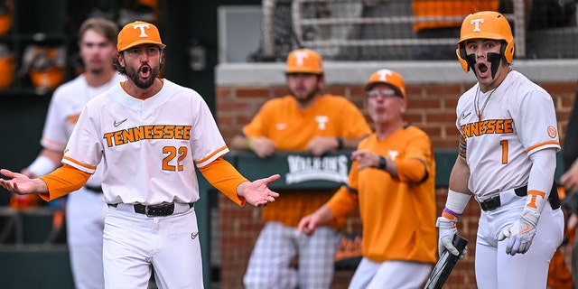 Tennessee head coach Tony Vitello and outfielder Drew Gilbert (1) react to a call during game one of the NCAA Super Regionals between the Tennessee Volunteers and Notre Dame Fighting Irish on June 10, 2022, at Lindsey Nelson Stadium in Knoxville, TN. 