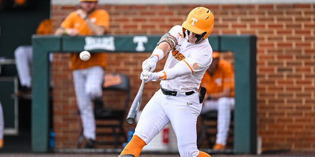 Tennessee left fielder Drew Gilbert (1) hits the ball during game 1 of the NCAA Super Regionals between the Tennessee Volunteers and Notre Dame Fighting Irish on June 10, 2022 at Lindsey Nelson Stadium in Knoxville, TN. 