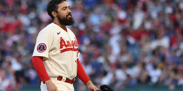 Anthony Rendon #6 of the Los Angeles Angels returns to the dugout in the first inning during the game between the New York Mets and the Los Angeles Angels at Angel Stadium on Saturday, June 11, 2022, in Anaheim, California. 