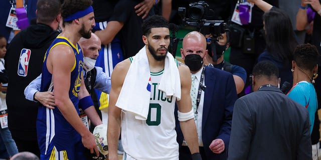 Boston Celtics forward Jayson Tatum (0) walks off the court after their 103-90 loss to the Golden State Warriors in game 6. The Boston Celtics hosted the Golden State Warriors for Game Six of the NBA Finals at the TD Garden in Boston on June 17, 2022. 
