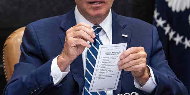 President Joe Biden speaks from his notes at the White House on June 23, 2022. (Jim Watson/AFP via Getty Images)