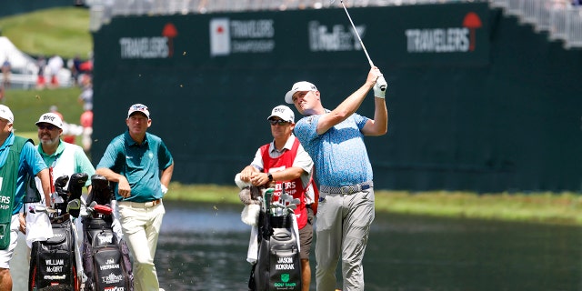 Jason Kokrak, of Hudson, OH, hits from the 16th tee during the First Round of the Travelers Championship on June 23, 2022, at TPC River Highlands in Cromwell, CT. 