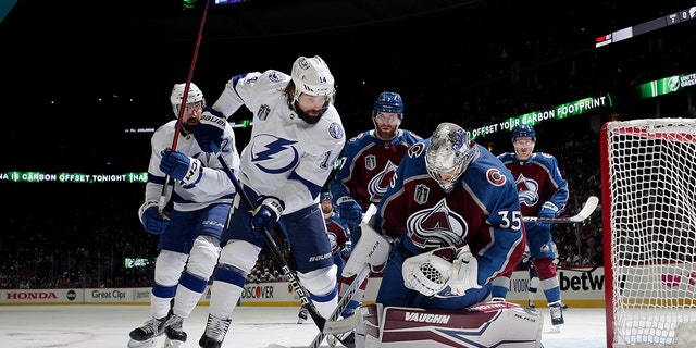 Colorado Avalanche goaltender Darcy Kumper (35) makes a save against Pat Maroon (14) of the Tampa Bay Lightning in Game 5 of the 2022 Stanley Cup Finals at Ball Arena on June 24, 2022 in Denver.  The Lightning defeated the Avalanche 3-2.  
