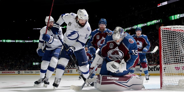 Goaltender Darcy Kuemper (35) of the Colorado Avalanche makes a save against Pat Maroon (14) of the Tampa Bay Lightning in Game 5 of the 2022 Stanley Cup Final at Ball Arena June 24, 2022, in Denver. The Lightning defeated the Avalanche 3-2.