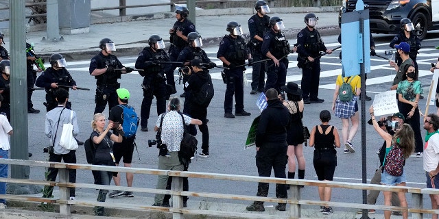 Activists protest along Broadway over the 110 freeway as LAPD blocks the freeway access after the Supreme Court overturned Roe vs. Wade, eliminating women's right to abortion after almost 50 years in Los Angeles on Friday, June 24, 2022.