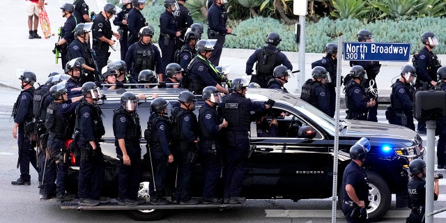 Los Angeles, CA - June 24: Activists protest along Broadway over the 110 freeway as LAPD blocks the freeway access after the supreme court overturned Roe vs. Wade, eliminating women's right to abortion after almost 50 years in Los Angeles on Friday, June 24, 2022. (Photo by Keith Birmingham/MediaNews Group/Pasadena Star-News via Getty Images)