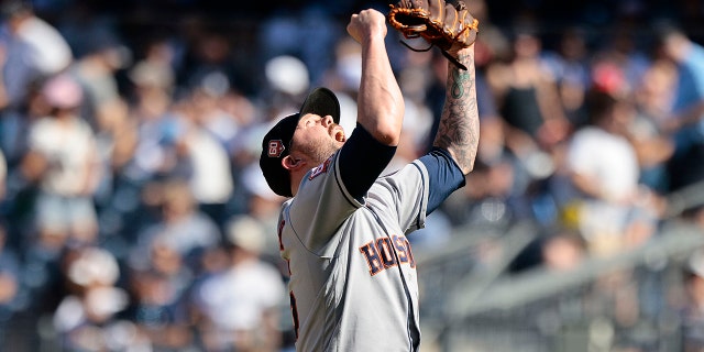 Ryan Pressly #55 of the Houston Astros reacts after the final out of a combined no hitter against the New York Yankees at Yankee Stadium on June 25, 2022 in the Bronx borough of New York City. 