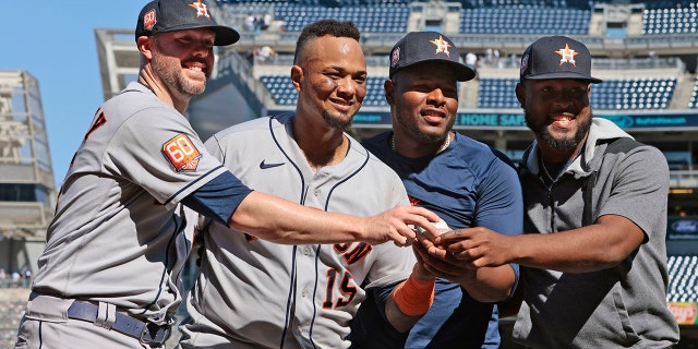 Ryan Pressly #55, Martin Maldonado #15, Hector Neris #50 of the Houston Astros and Cristian Javier #53 of the Houston Astros pose for a photo after pitching a combined no hitter against the New York Yankees at Yankee Stadium on June 25, 2022 in the Bronx borough of New York City. The Astros defeated the Yankees 3-0. 