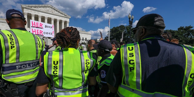 WASHINGTON, USA - JUNE 25: Pro-life-abortion and abortion rights demonstrators rally in front of the US Supreme Court in Washington, DC, on June 25, 2022, a day after the Supreme Court released a decision on Dobbs v Jackson Women's Health Organization, striking down the right to abortion. 