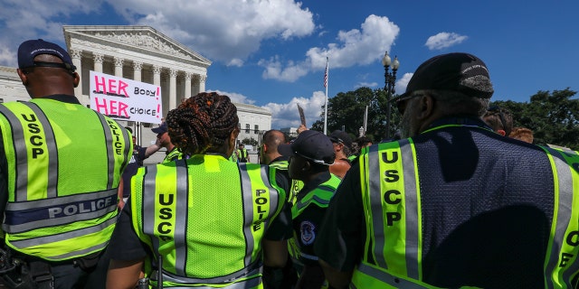 WASHINGTON, USA - JUNE 25: Pro-life-abortion and abortion rights demonstrators rally in front of the US Supreme Court in Washington, DC, on June 25, 2022, a day after the Supreme Court released a decision on Dobbs v Jackson Women's Health Organization, striking down the right to abortion. 