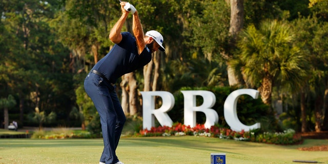 Dustin Johnson of the United States plays his shot from the 14th tee during the final round of the RBC Heritage June 21, 2020, at Harbour Town Golf Links in Hilton Head Island, S.C.