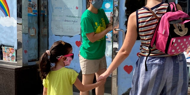 Daycare drop off, phase 4 reopening during Coronavirus Pandemic, Queens, New York. (Photo by: Lindsey Nicholson/Education Images/Universal Images Group via Getty Images)