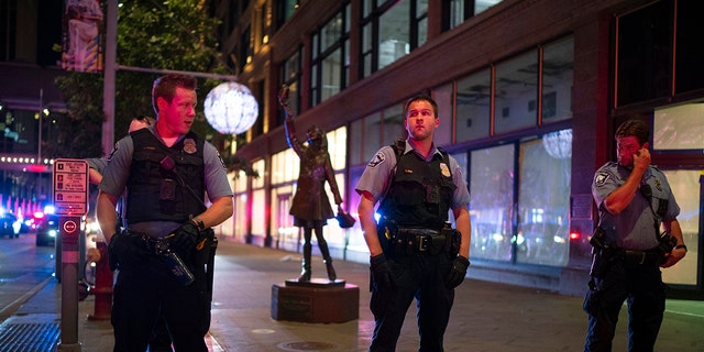 Minneapolis police formed a line on the Nicollet Mall at S. 7th St. near where a Foot Locker store was looted. Crowds gathered in downtown Minneapolis Wednesday night, August 26, 2020, after one person was reported dead after an altercation in a parking ramp. 