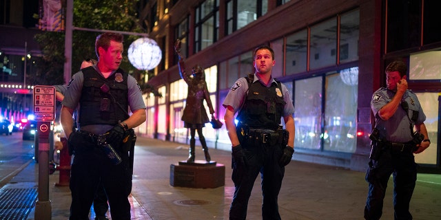 Minneapolis police formed a line on the Nicollet Mall at S. 7th St. near where a Foot Locker store was looted. Crowds gathered in downtown Minneapolis Wednesday night, August 26, 2020, after one person was reported dead after an altercation in a parking ramp. 