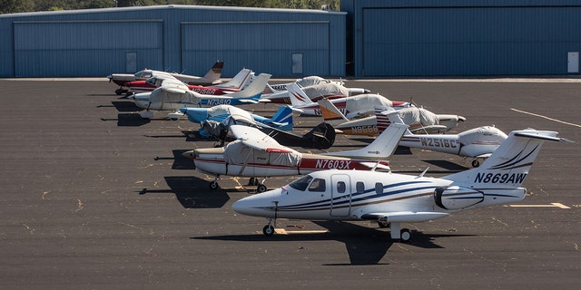 NORTH AUBURN, CA - AUGUST 31:  Private planes and jets are parked on the tarmack at Auburn Municipal Airport on August 31, 2021, in North Auburn, California. (Photo by George Rose/Getty Images)