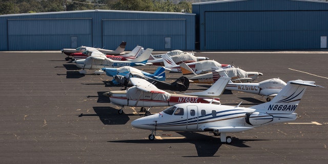 NORTH AUBURN, CA - AUGUST 31:  Private planes and jets are parked on the tarmack at Auburn Municipal Airport on August 31, 2021, in North Auburn, California. (Photo by George Rose/Getty Images)