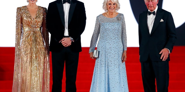 Catherine, Duchess of Cambridge, Prince William, Duke of Cambridge, Camilla, Duchess of Cornwall and Prince Charles, Prince of Wales attend the "No Time To Die" World Premiere at the Royal Albert Hall on September 28, 2021, in London, England. 