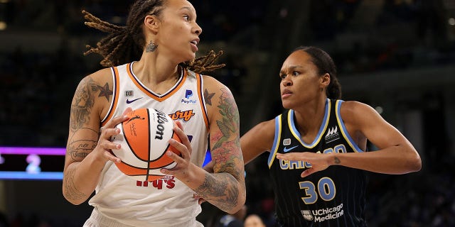 Brittney Griner #42 of the Phoenix Mercury is defended by Azurá Stevens #30 of the Chicago Sky during the first half of Game Four of the WNBA Finals at Wintrust Arena on October 17, 2021 in Chicago, Illinois.