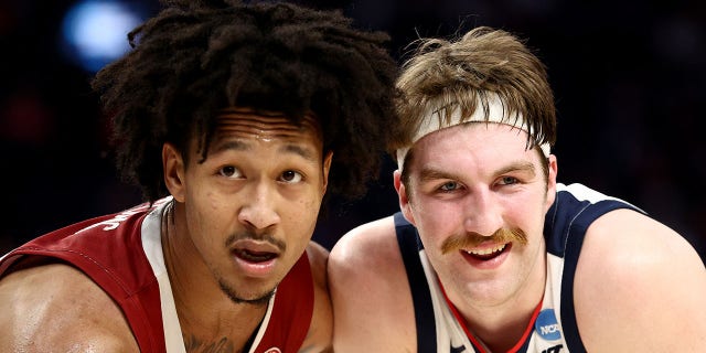 Jaylin Williams of the Arkansas Razorbacks and Drew Timme of the Gonzaga Bulldogs during the Sweet 16 round game of the NCAA Men's Basketball Tournament at Chase Center on March 24, 2022, in San Francisco, California.