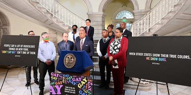 New York City Mayor Eric Adams, Elisa Crespo, executive director, NEW Pride Agenda and Kevin Jennings, CEO, Lambda Legal; and founder, Gay, Lesbian and Straight Education Network announce the launch of digital billboards and creative ads supporting LGBTQ+ community on April 4, 2022, in New York City.